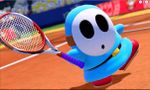 A cyan Shy Guy enters the Clay Court.