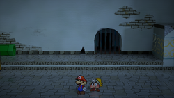 Mario at a hidden ? Block location in Rogueport Underground, in the remake of the Paper Mario: The Thousand-Year Door for the Nintendo Switch.
