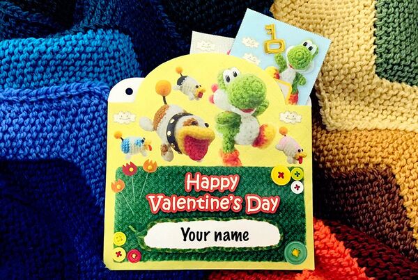 Photograph of a printed Poochy & Yoshi's Woolly World pouch for Valentine's Day cards
