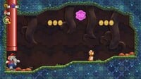 The second 10-flower coin in the Scram, Skedaddlers! level in Super Mario Bros. Wonder, at the top of a hidden cave