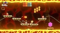 The first 10-flower coin in the Wavy Ride through the Magma Tube level in Super Mario Bros. Wonder