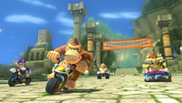 The racers in the Thwomp Ruins course of Mario Kart 8