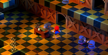 The ground floor and lobby of Booster Tower, as seen in Super Mario RPG (Nintendo Switch).