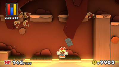 Mario near a Thing Replica Card in Redpepper Volcano of Paper Mario: Color Splash.