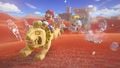 Mario riding a Jaxi through the desert