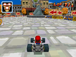 The statue and roundabout in Delfino Plaza