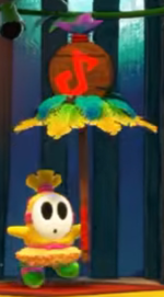 A yellow Jam Guy from Yoshi and the Mysterious Book.
