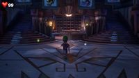 Luigi walking in the Grand Lobby in Luigi's Mansion 3