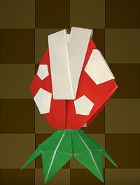 An origami Jumping Piranha Plant from Paper Mario: The Origami King.