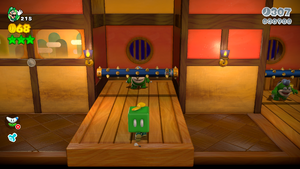 An 8-bit Luigi found in Hands-On Hall in Super Mario 3D World.