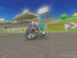 Waluigi racing on the course in the credits