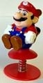 A figurine based on Raccoon Mario which bounces up if pushed down