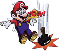 Mario avoiding a falling mallet in Helmet
