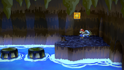 Mario at a hidden ? Block location in Pirate's Grotto, in the remake of the Paper Mario: The Thousand-Year Door for the Nintendo Switch.