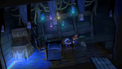 Mario getting the Black Key from an Ember in Pirate's Grotto of Paper Mario: The Thousand-Year Door for Nintendo Switch.