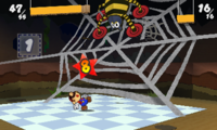 The screenshot of Mario fighting Big Scuttlebug in Rustle Burrow.