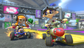 Inkling Girl and Boy battling on Urchin Underpass, while driving the Splat Buggy and Inkstriker respectively.
