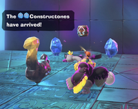 Screenshot from Donkey Kong Bananza, where two Fractones are referred to as Constructones within the Ostrich Bananza Rehearsal