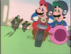 Mario and Luigi driving away from the Dino Riders in Born to Ride.