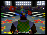 King Krusha K. Rool charging at Chunky Kong in the fifth and final round of the boxing arena in Donkey Kong 64