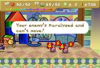 A group of Shy Guys under the Paralyzed status in Paper Mario.