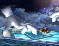 Diddy Kong running from Crazy Hand in Super Smash Bros. Brawl