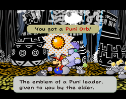 Mario getting the Puni Orb from Puni Elder in The Great Tree of Paper Mario: The Thousand-Year Door.