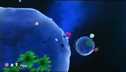 Mario on an asteroid in the E3 2006 build of Super Mario Galaxy.