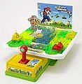 A board game called New Super Mario Bros. Crystal Maze, modeled after New Super Mario Bros. It is composed of mazes for the player to control with the joystick installed. Controlling the stick makes the ball roll in a certain way it was tilted. This board game was manufactured by the Japanese company Epoch.[5]