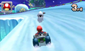 Mario driving on Rosalina's Ice World with a Blooper flying by. A snow-covered Dome appears. The Gateway Galaxy's Starting Planet appears farther back.