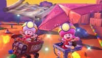 Captain Toad and Toadette (Explorer) gliding on GBA Sunset Wilds in Mario Kart Tour