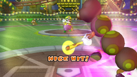 A Wiggler bats the ball in Mario Super Sluggers.
