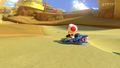 Toad, driving the Blue Falcon.