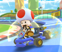 Thumbnail of the Lakitu Cup challenge from the 2023 Mario vs. Luigi Tour; a Time Trial challenge set on N64 Luigi Raceway R
