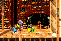 Dixie Kong holding a Steel Barrel toward Koin in Squeals on Wheels in the Game Boy Advance remake of Donkey Kong Country 3