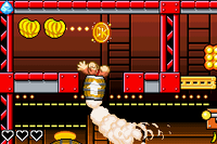 Donkey Kong jumps up to the gold medal of K. Kruizer III Engine in DK: King of Swing