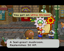 Mario getting an Ultra Shroom from Lucky in Rogueport of Paper Mario: The Thousand-Year Door.