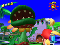 Mario fights Petey Piranha in an early Bianco Hills.