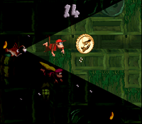Diddy Kong and Dixie Kong reach the end of the second Bonus Level of Glimmer's Galleon