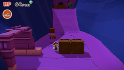Mario standing near two crates containing a Shiny Ice Flower and a Small Bag of Confetti in Scorching Sandpaper Desert of The Origami King.