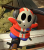 An outfit with a headset and striped coat
