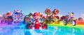 Mario and many other characters driving on Rainbow Road