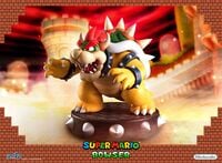 A statue of Bowser made by First4Figures.
