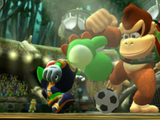 Yoshi and Donkey Kong battling for the ball