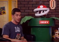The Play Nintendo Show hosts Andrew Trego and Izzy, who is a Piranha Plant.