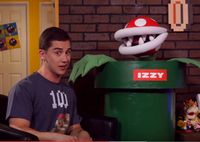 The Play Nintendo Show hosts Andrew Trego and Izzy, who is a Piranha Plant.