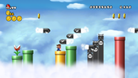 Mario avoids a few Bullet Bills, in New Super Mario Bros. Wii.