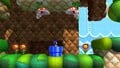 Sonic on top of a blue Warp Pipe underneath two Piranha Plants on the roof of a cave