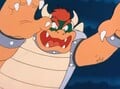 Bowser charging towards Mario