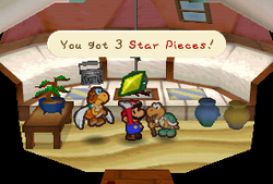 Mario getting a Star Piece from Koopa Koot in Paper Mario